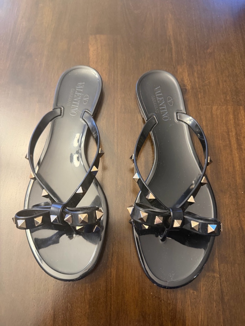 Valentino Black Jelly Bow Sandals with Gold Pyramid Studs